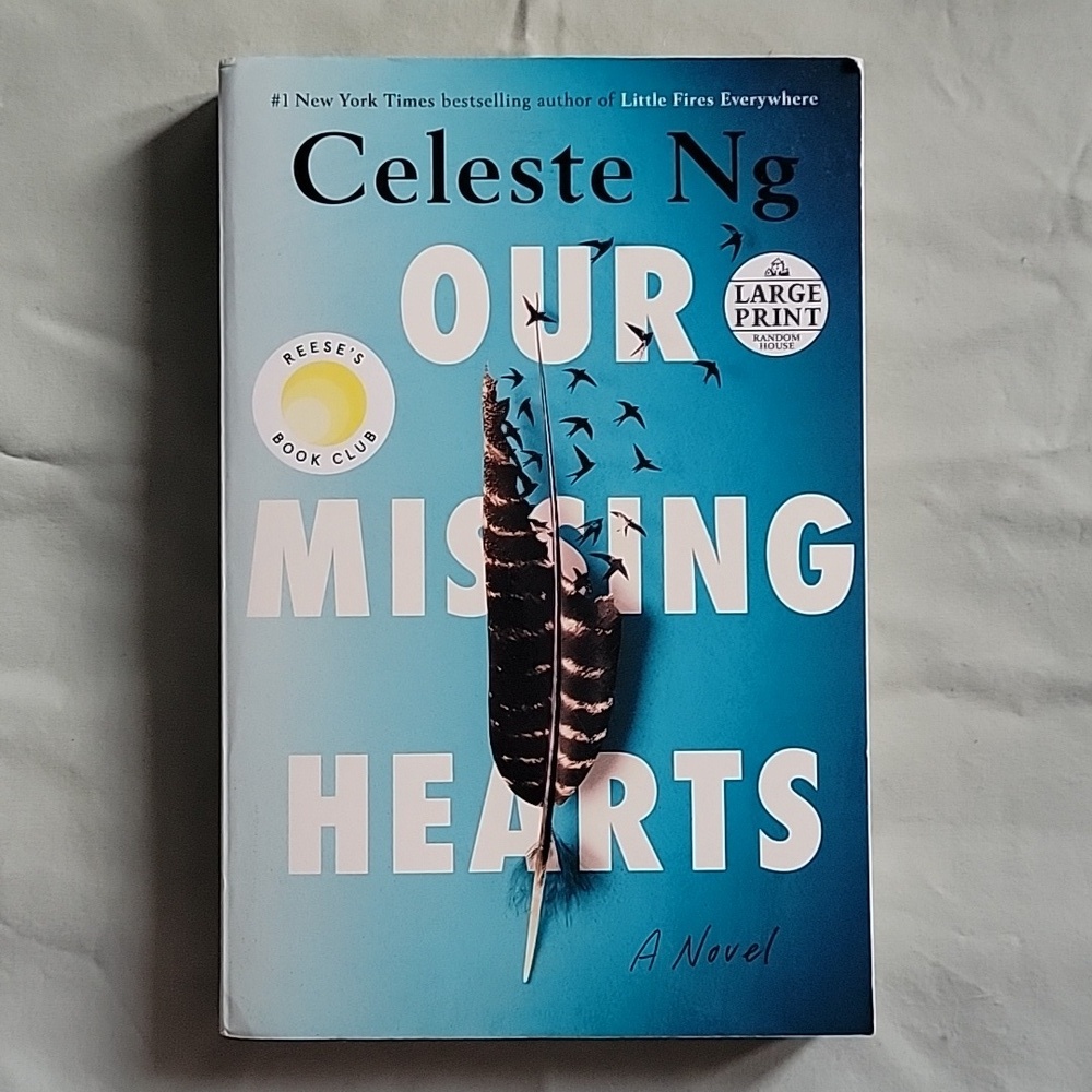 Our Missing Hearts, A Novel, paperback book‎ by Celeste Ng. 400 pages.